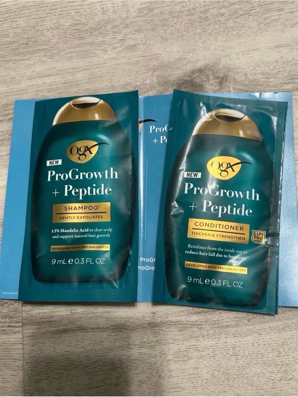 OGX ProGrowth + Peptide Shampoo & Conditioner Travel Sachets in Teal